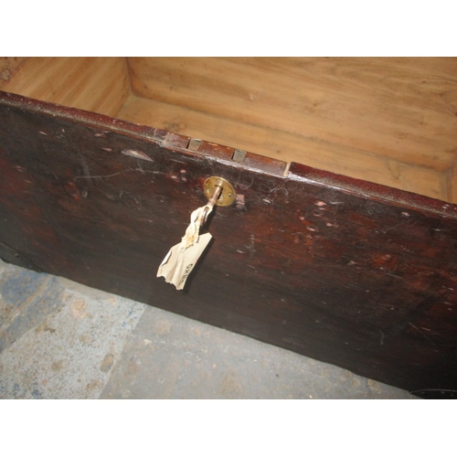 321 - A vintage pine storage trunk, in pre-owned condition with key and working lock. Approximate dimensio... 