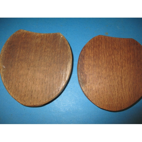 261 - A pair of vintage Robert Thompson (Mouseman) carved wood horseshoe ashtrays, both in pre-owned used ... 