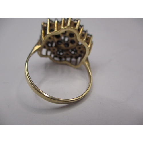 9 - A 9ct gold diamond and sapphire cluster ring, approx. ring size ‘Q’, approx. weight 4.8g in useable ... 