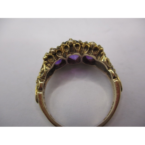 14 - A vintage 9ct gold ring with 3 large amethyst?, approx. ring size ‘O’, approx. weight 4g, in good pr... 