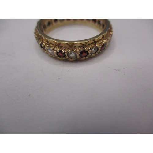 16 - A vintage 9ct gold diamond and Ruby? Eternity ring, approx. ring size ‘Q’ approx. weight 3.7g in pre... 