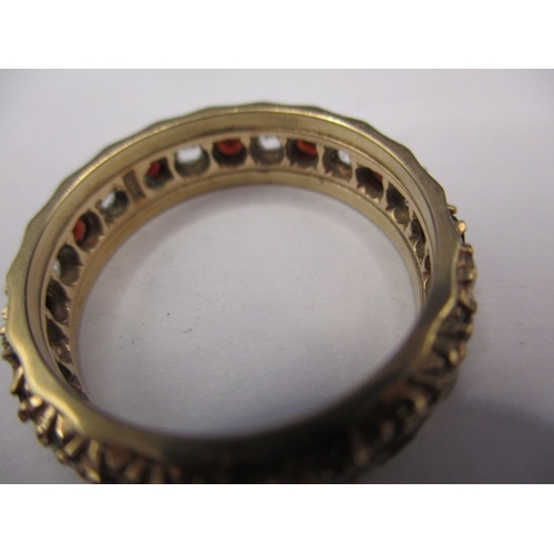 16 - A vintage 9ct gold diamond and Ruby? Eternity ring, approx. ring size ‘Q’ approx. weight 3.7g in pre... 