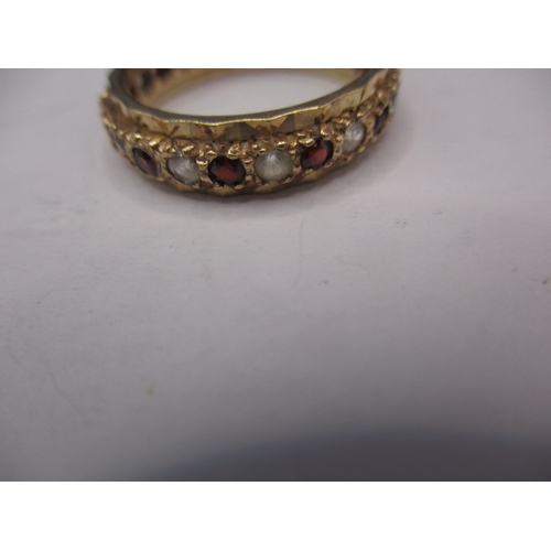 16 - A vintage 9ct gold diamond and Ruby? Eternity ring, approx. ring size ‘Q’ approx. weight 3.7g in pre... 