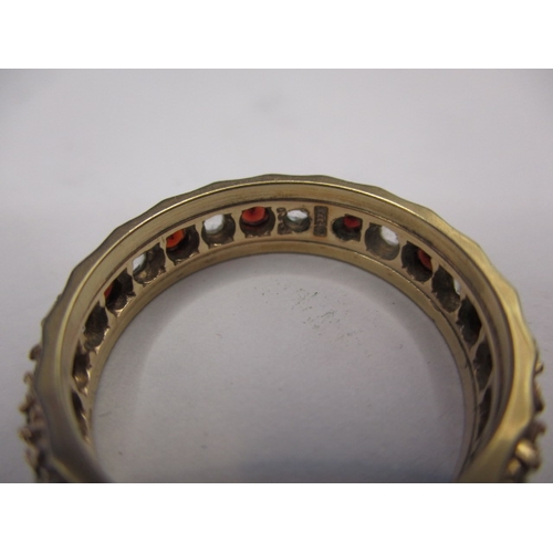 16 - A vintage 9ct gold diamond and Ruby? Eternity ring, approx. ring size ‘Q’ approx. weight 3.7g in pre... 