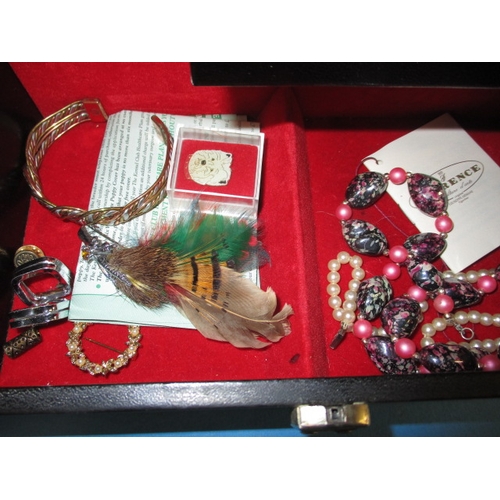 247 - Two jewellery boxes with contents of costume jewellery, all in used condition