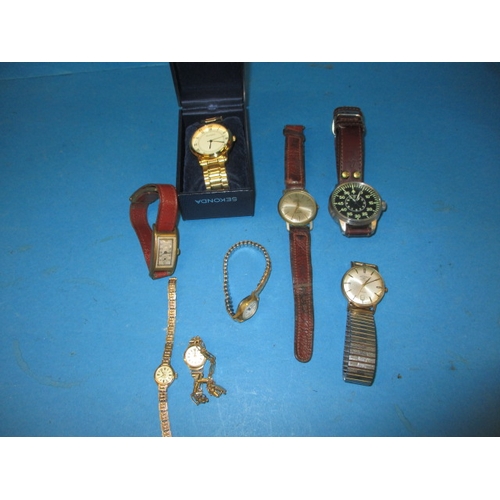 253 - A parcel of vintage wrist watches to include two 9ct gold cased examples, one with gold strap, all i... 