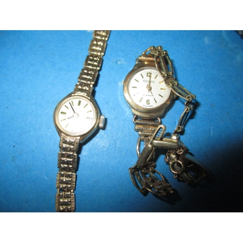 253 - A parcel of vintage wrist watches to include two 9ct gold cased examples, one with gold strap, all i... 