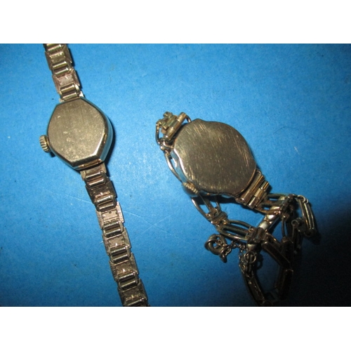 253 - A parcel of vintage wrist watches to include two 9ct gold cased examples, one with gold strap, all i... 