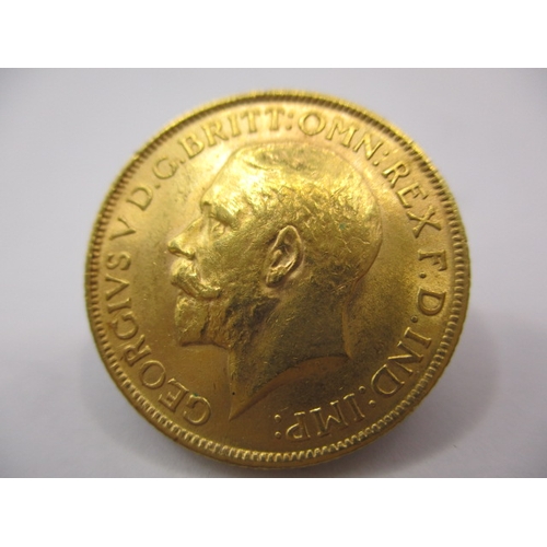 115 - A George V gold sovereign dated 1912, a circulated coin with very fine definition of features