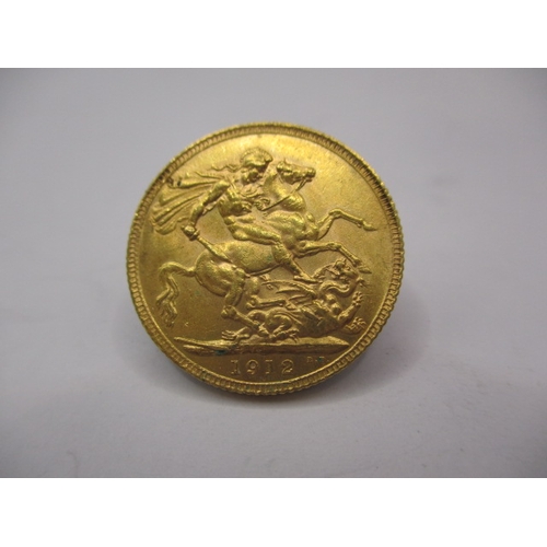 115 - A George V gold sovereign dated 1912, a circulated coin with very fine definition of features