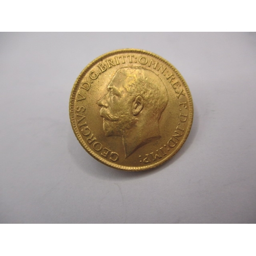 116 - A George V gold sovereign dated 1912, a circulated coin with very fine definition of features