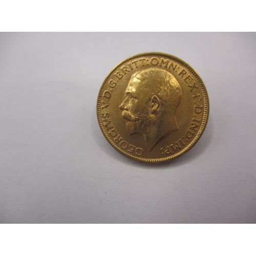 118 - A George V gold sovereign dated 1913, a circulated coin with very fine definition of features