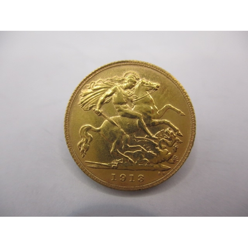 173 - A George V gold half sovereign dated 1913, a circulated coin with fine definition of features