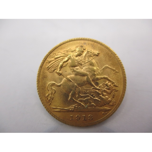 174 - A George V gold half sovereign dated 1913, a circulated coin with very fine definition of features