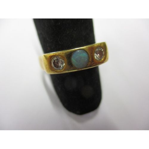 22 - An 18ct yellow gold diamond and opal ring, approx. ring size ‘N+’ approx. weight 3.8g in useable pre... 