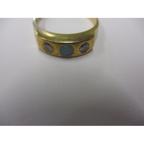 22 - An 18ct yellow gold diamond and opal ring, approx. ring size ‘N+’ approx. weight 3.8g in useable pre... 