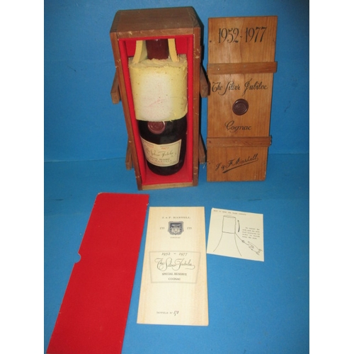 335 - A boxed bottle of 1977 Silver Jubilee special reserve cognac by  J & F Martell. Produced to commemor... 