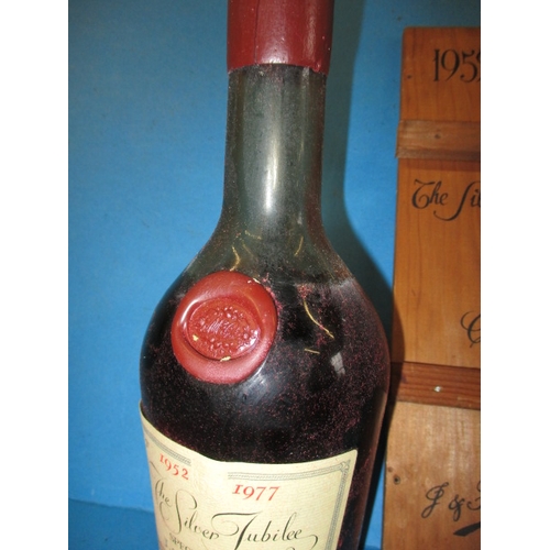 335 - A boxed bottle of 1977 Silver Jubilee special reserve cognac by  J & F Martell. Produced to commemor... 