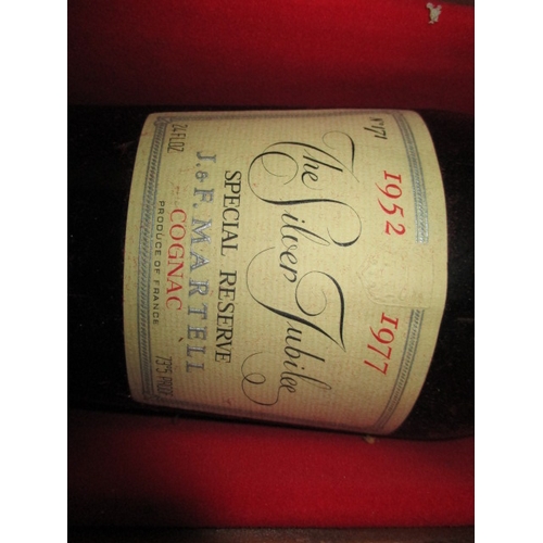 335 - A boxed bottle of 1977 Silver Jubilee special reserve cognac by  J & F Martell. Produced to commemor... 