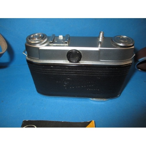 288 - A vintage Lubitel 2 camera and a Kodak Retinette, both in used condition with leather cases and not ... 