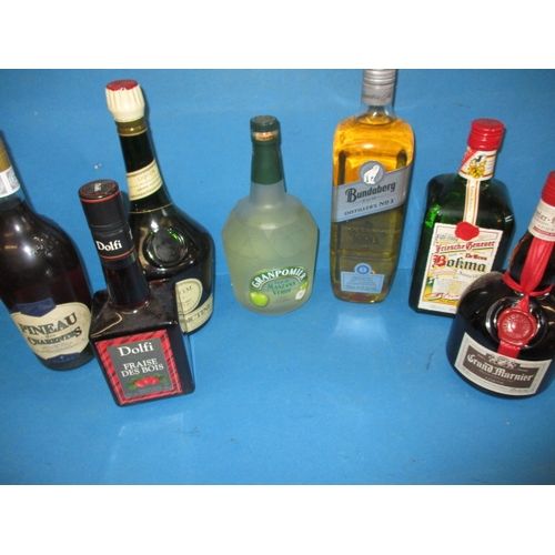 357 - 7 Bottles of mixed spirits and liqueurs, all unopened and with contents