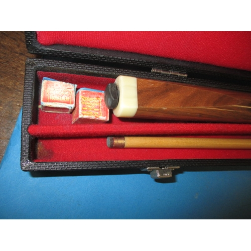 327 - A cased Ray Reardon snooker cue, in good used condition