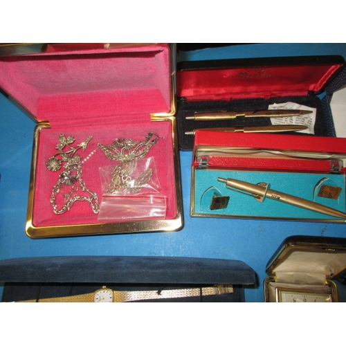 254 - A parcel of vintage watches, jewellery and pens, to include some silver and gold items, and a Pandor... 