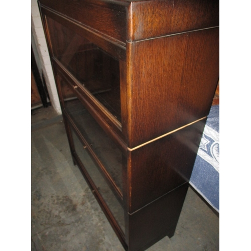 315 - A vintage barristers type 3 stack bookcase, by Dunn approx. height 122cm  in useable pre-owned condi... 