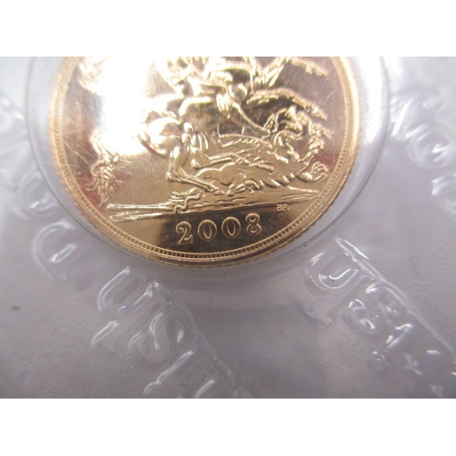 159 - A Royal Mint uncirculated gold sovereign dated 2008, in original vacuum sealed packaging