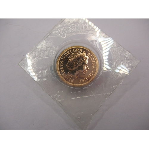 160 - A Royal Mint uncirculated gold sovereign dated 2008, in original vacuum sealed packaging