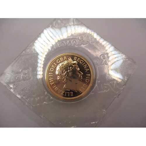 161 - A Royal Mint uncirculated gold sovereign dated 2008, in original vacuum sealed packaging