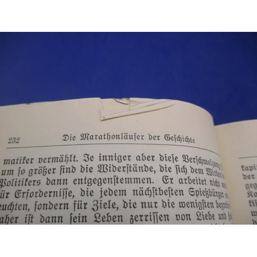 270 - A 1936 German edition of Adolf Hitler’s Mein Kamph, hardback and in pre-owned condition with use-rel... 