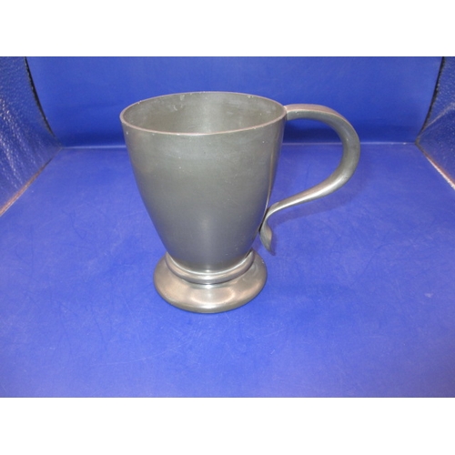 259 - A Liberty’s Tudric pewter tankard, the handle showing art nouveau influences, approx. height 10.5cm,... 