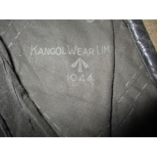 276 - A 1944 dated sand coloured military beret by Kangol, outline of where a badge was fitted which was p... 