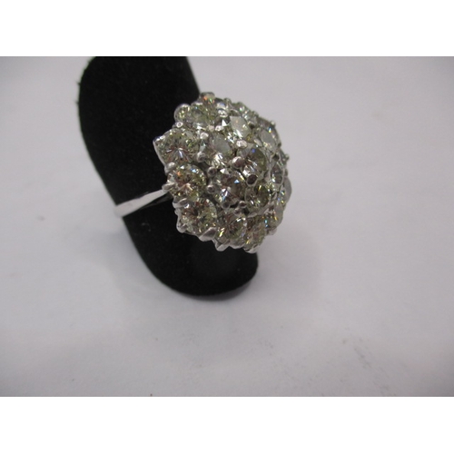 25 - An 18ct white gold diamond cluster ring, having approx. 4.2ct diamonds ,approx. ring size ‘N+’, appr... 