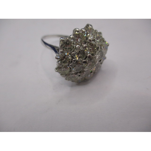 25 - An 18ct white gold diamond cluster ring, having approx. 4.2ct diamonds ,approx. ring size ‘N+’, appr... 