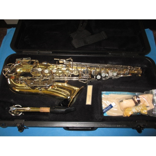 296 - A Selmar Bundy saxophone in hard case, serial number 1189535, in hard case, in good pre-owned condit... 