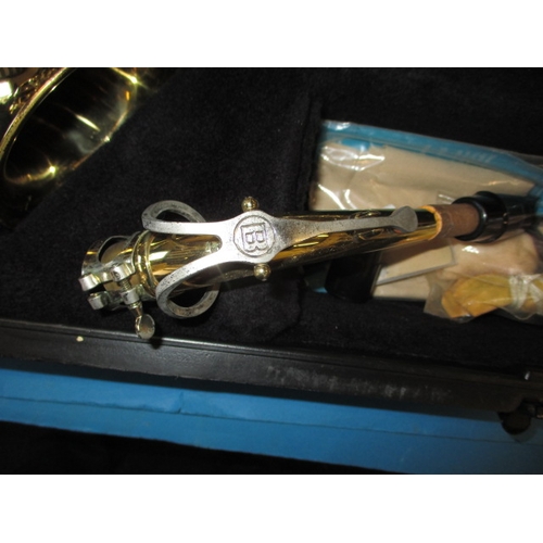 296 - A Selmar Bundy saxophone in hard case, serial number 1189535, in hard case, in good pre-owned condit... 