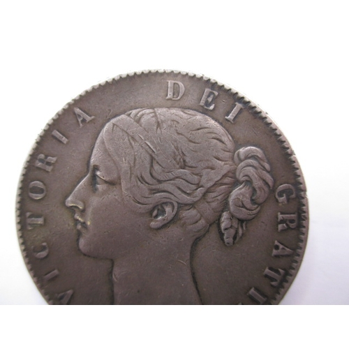 187 - An 1845 silver crown of young Victoria, the truncation marked for W Wyon, a circulated coin with ver... 