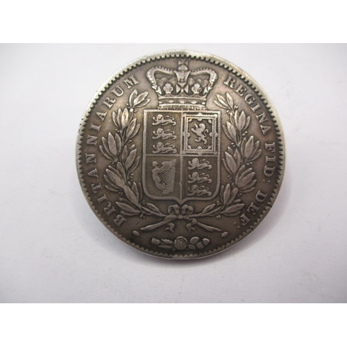 187 - An 1845 silver crown of young Victoria, the truncation marked for W Wyon, a circulated coin with ver... 