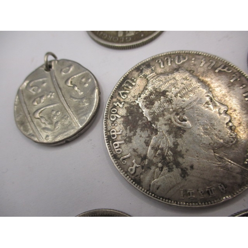 211 - A parcel of vintage world coins, to include silver and part silver examples. Various grades, all cir... 