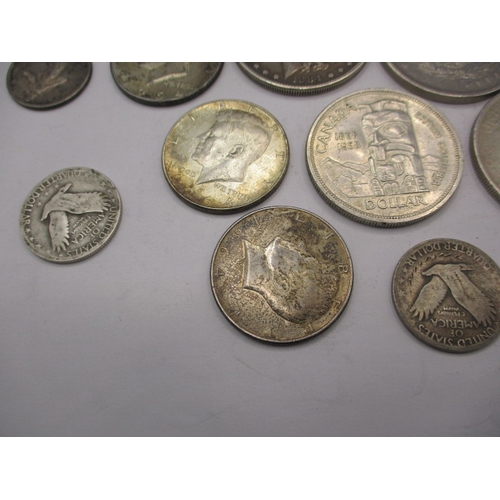 212 - A quantity of American and Canadian coins, to include some silver examples. All in circulated condit... 