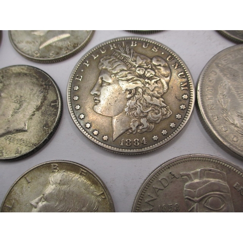 212 - A quantity of American and Canadian coins, to include some silver examples. All in circulated condit... 