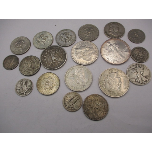 212 - A quantity of American and Canadian coins, to include some silver examples. All in circulated condit... 