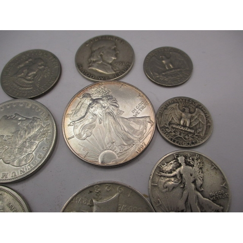 212 - A quantity of American and Canadian coins, to include some silver examples. All in circulated condit... 