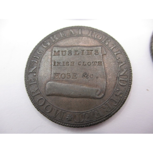 200 - A George III silver crown and two 18th century trade tokens from a lace maker, all in circulated con... 