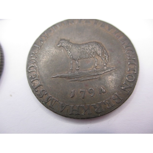 200 - A George III silver crown and two 18th century trade tokens from a lace maker, all in circulated con... 