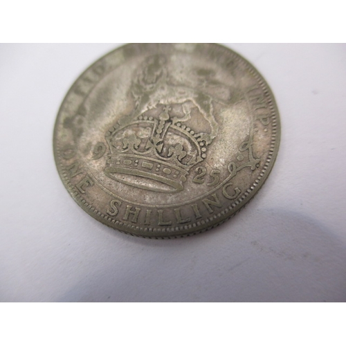 200 - A George III silver crown and two 18th century trade tokens from a lace maker, all in circulated con... 