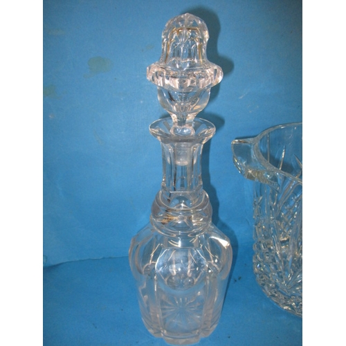 331 - A lead crystal bottle cooler bucket, a decanter and large water jug, all in good pre-owned condition... 