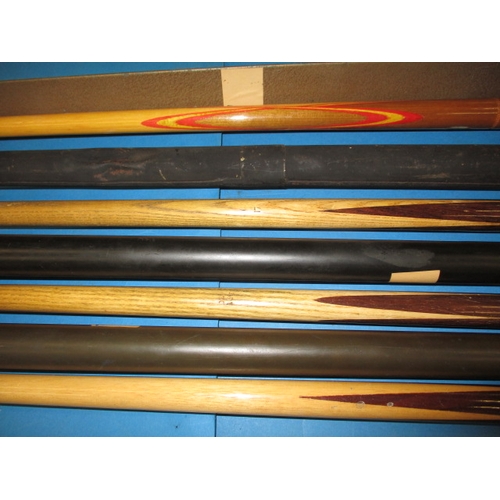 328 - 4 Vintage snooker cues, to include a Joe Davis club and a Peall Record cue, all one piece and in har... 